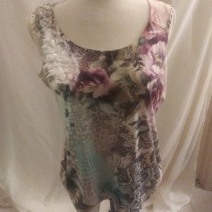 Bleu sleeveless shirt with fabric flower embellish